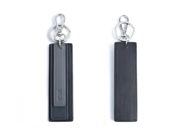 nava-design-smooth-portachiavi-con-charm-in-pelle-e-moschettone-grigio-blu-nero- image 1